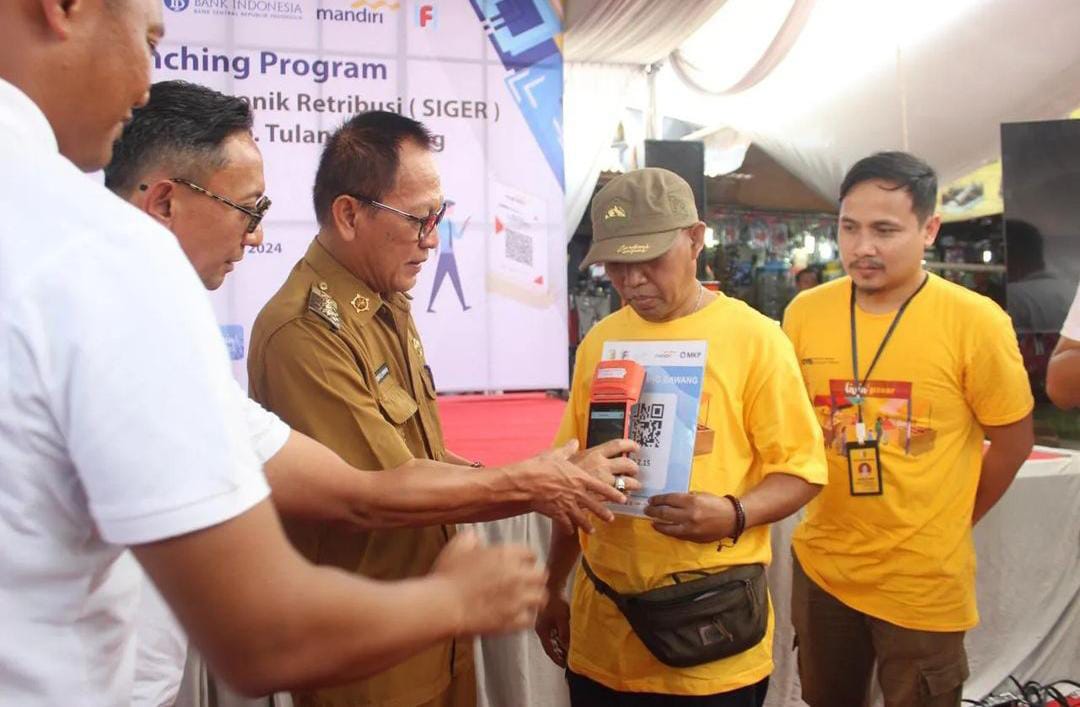 Tulang Bawang Resmi Terapkan E-Retribusi, Pj Bupati Qudrotul Ikhwan: Semua Diuntungkan