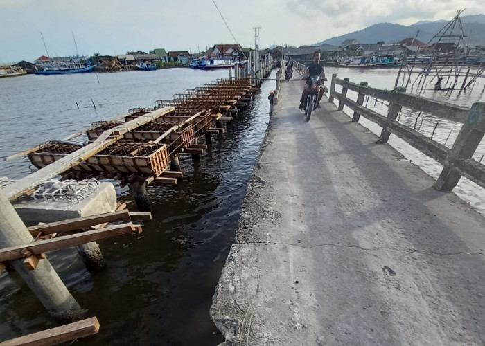 BELUM RAMPUNG