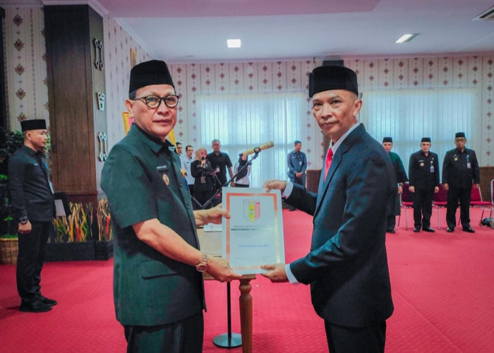 Pj Bupati Tulang Bawang Qudrotul Ikhwan Resmi Lantik Nanan Wisnaga Sebagai Kadis Kominfo