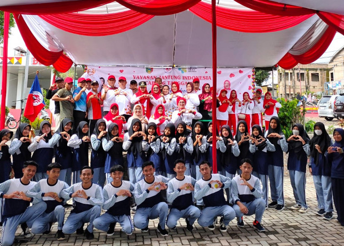 YJI Tanggamus Sosialisasi Kesehatan Jantung dan Gelar Senam Hip Heart Bersama Siswa SMA 