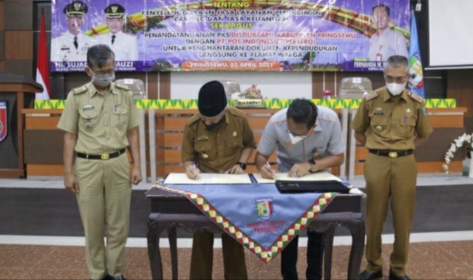 Pemkab Pringsewu-PT Pos Kerjasama Layanan Pengiriman Barang dan Jasa Keuangan