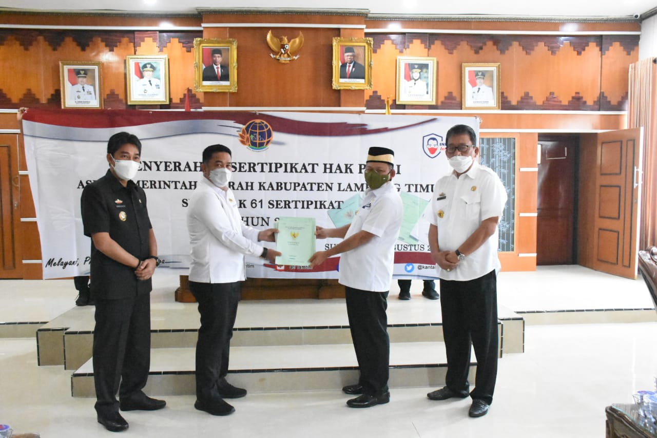 Bupati Lamtim Terima Penyerahan Sertifikat Tanah Aset Pemkab